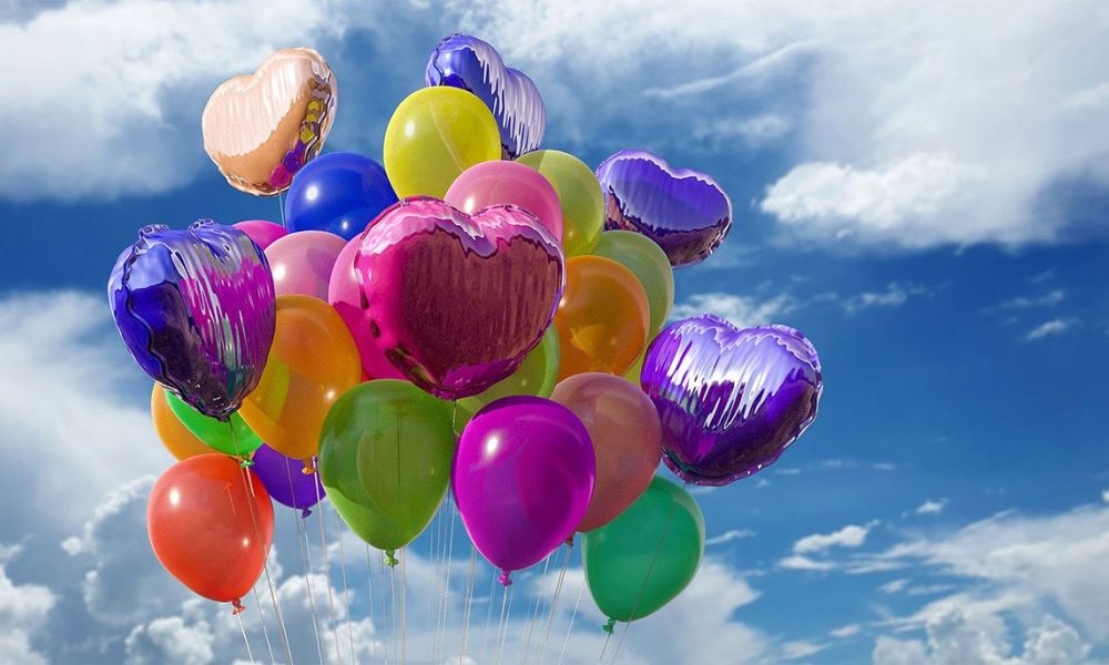 balloons floating off to the sky