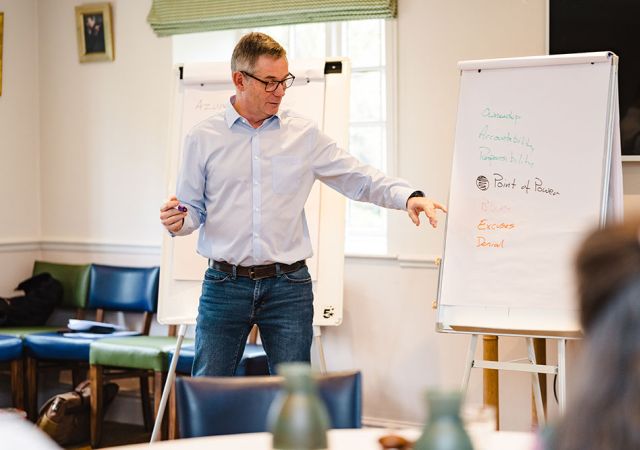 Rupert showing strategy diagram